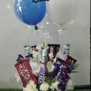 Flowers and chocolates balloon basket